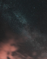 Fototapeta na wymiar Milky Way with pinky clouds.