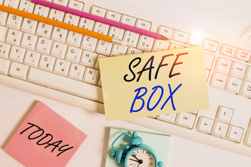 Text sign showing Safe Box. Business photo showcasing A small structure where you can keep important or valuable things Flat lay above empty note paper on the pc keyboard pencils and clock
