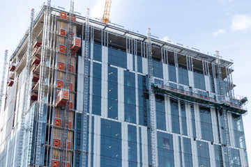 high rise building under construction in downtown Portland Oregon.
