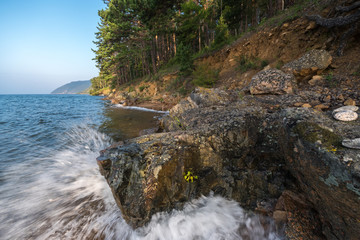 Waves breaking on coastal cliffs on Lake Baikal