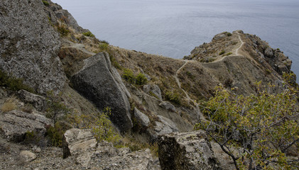  Mountain landscape, cliff and sky. Tourism and travel.