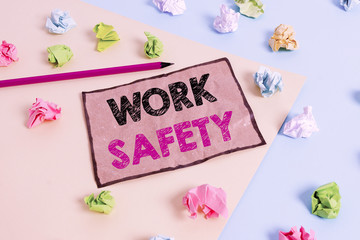 Handwriting text writing Work Safety. Conceptual photo policies and procedures in place to ensure safety in workplace Colored crumpled papers empty reminder blue yellow background clothespin