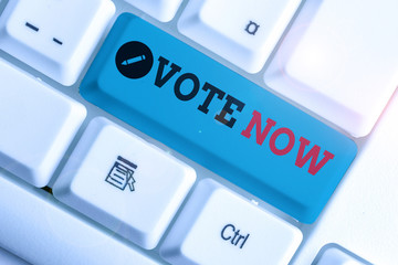 Conceptual hand writing showing Vote Now. Concept meaning formal indication of choice between two...