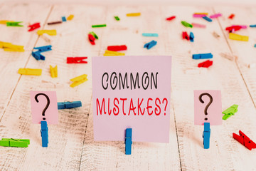 Writing note showing Common Mistakes question. Business concept for repeat act or judgement...