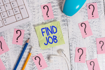 Word writing text Find Job. Business photo showcasing An act of demonstrating to find or search work suited for his profession Writing tools, computer stuff and scribbled paper on top of wooden table