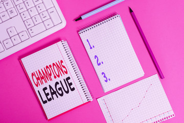 Word writing text Champions League. Business photo showcasing Yearly football competition from each country in Europe Writing equipments and computer stuffs placed above colored plain table