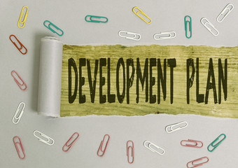 Conceptual hand writing showing Development Plan. Concept meaning the planning of the development...
