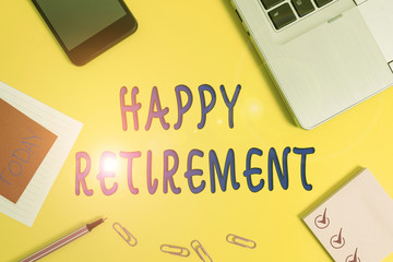 Text sign showing Happy Retirement. Business photo text having a dependable monthly pension check Living the job Laptop smartphone notepad marker paper sheet note clips colored background