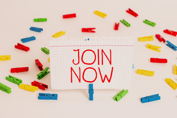 Writing note showing Join Now. Business concept for An invite to a demonstrating or a friend to become a member of the group Colored clothespin papers empty reminder white floor background office