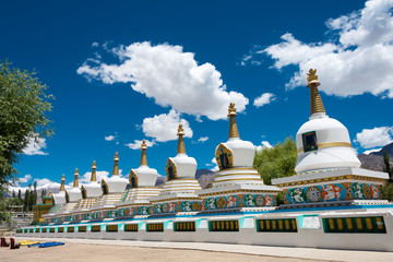 Ladakh, India - Jul 03 2019 - Tibetan Stupa at The Dalai Lama's Palace (JIVETSAL / His Holiness Photang) in Choglamsar, Ladakh, Jammu and Kashmir, India. - obrazy, fototapety, plakaty