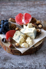Blue cheese with nuts and fruits. Cheese appetizer. Keto diet. Keto Set