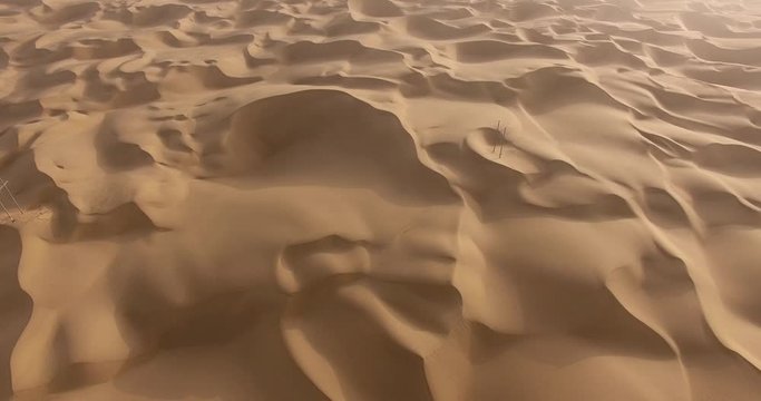 aerial view of sand and waves
