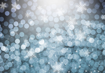 Christmas blurred background decorated with bokeh lights and snowflakes. For the computer screen image beautiful