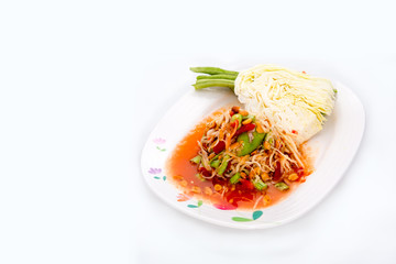 Thai traditional food named Som tom. Papaya salad in Thai restaurant.