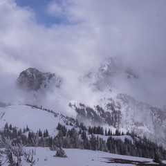 Cloudy, snow-capped peaks from Crystal Mountain, Washington