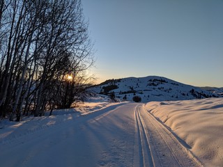 Cross country ski trail at sunrise in methow valley, washington