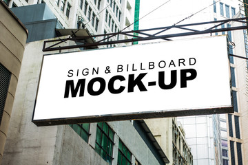 Obraz premium Mock up signboard hanging over street walk