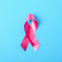 Breast cancer month concept, flat lay top view, pink ribbon