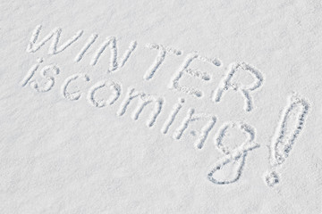 The well-known expression Winter is Coming written with a finger on fresh snow means that the cold season is approaching at the threshold of the end of autumn and on the eve of winter holidays