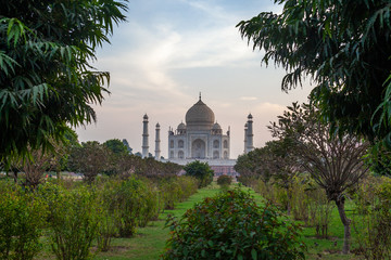 Sunrise at the wonderful Taj Mahal, in Agra, one of the seven world wonder. Giant mausoleum made of marble.
