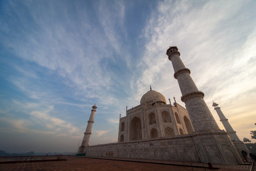 Sunrise at the wonderful Taj Mahal, in Agra, one of the seven world wonder. Giant mausoleum made of marble.