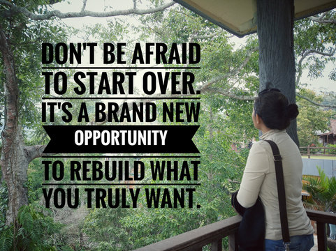 Inspirational motivational quote - Do not afraid to start over. It is a brand new opportunity to rebuild what you truly want. With young woman standing alone  looking at forest view background. 