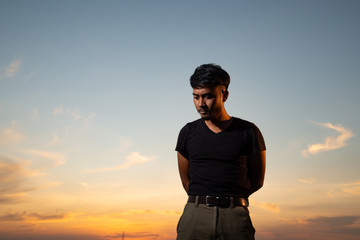 Fototapeta premium curious man in beautiful sky