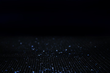 glitter classic blue lights background. de-focused. color of the year 2020