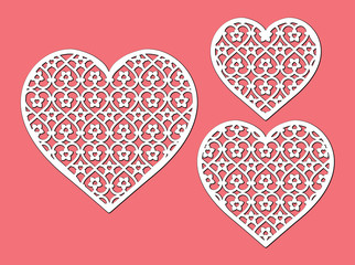 Openwork heart with a lace ornament. Laser cutting template. Valentine's Day sign, love symbol. Vector silhouette of element. Illustration isolated on red background for cut. Heart icon.