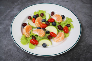 Dish of fruits salad for healthy eating 