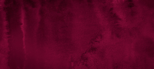 Dark saturated burgundy watercolor background with torn strokes and uneven spots. Trend color texture. Abstract background for design, layouts and patterns.