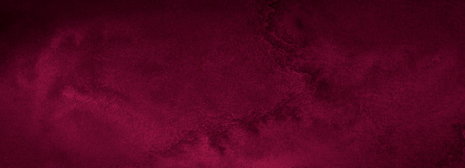 Dark saturated burgundy watercolor background with torn strokes and uneven spots. Trend color texture. Abstract background for design, layouts and patterns.