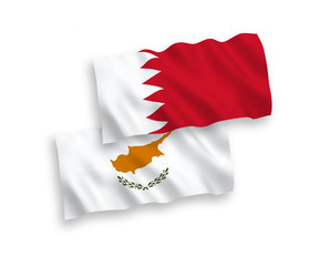 National vector fabric wave flags of Cyprus and Bahrain isolated on white background. 1 to 2 proportion.