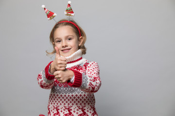 Little girl in winter look. Christmas concept.