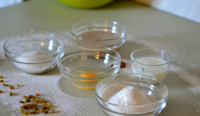 Ingredients for banana cupcakes with raisins and almonds 