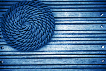 Nautical mooring rope blue toned background