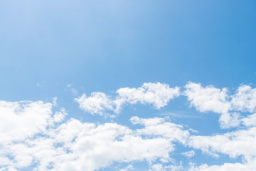 Bright sky with white clouds scattered for natural background