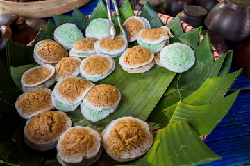 Serabi or surabi: Javanese traditional pancake that is made from rice flour with coconut milk or shredded coconut as an emulsifier. © reksitawardani