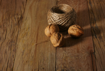 textured nuts on an old wooden table made of oak