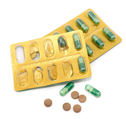 Pills in pack isolated on white background. close-up