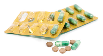 Pills in pack isolated on white background. close-up