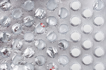 Pills in pack isolated on white background. close-up