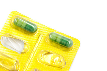 Pills in pack isolated on white background. close-up