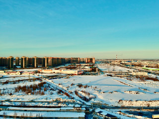 Fototapeta na wymiar Winter landscape with new buildings