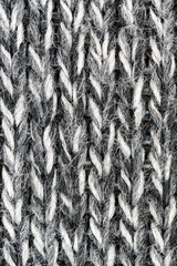 White natural texture of knitted wool textile material background. White cotton fabric woven canvas texture