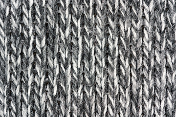 White natural texture of knitted wool textile material background. White cotton fabric woven canvas texture