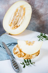 Still life of pieces of fresh juicy melon  on the table. Horizontal orientation