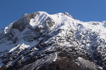 Naklejka premium High peaks of snowy mountains in Cajón del Maipo, in the central Andes of Chile.