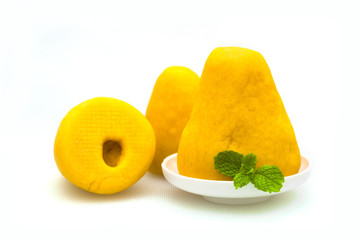 Wuwutou on a white background, dotted with a mint leaf.