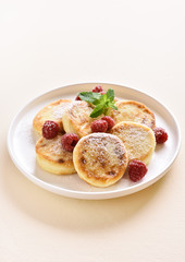 Cottage cheese pancakes with fresh raspberries
